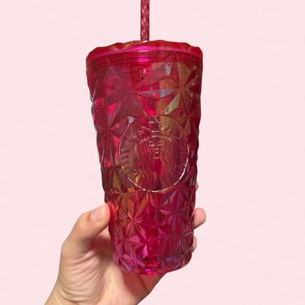 Pink starbucks tumbler with straw